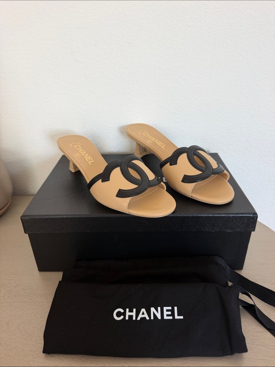 CHANEL Shoes - CHANEL Beige and Black CC Cutout Mule